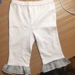 pink sweatpants with frills on the bottom